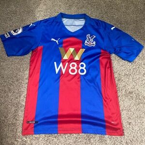 Crystal Palace home jersey size medium #25 Eze on the back. Good condition.